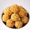pori-urundai-recipe-murmura-laddu-puffed-rice-ladoo-1-768x1152-removebg-preview